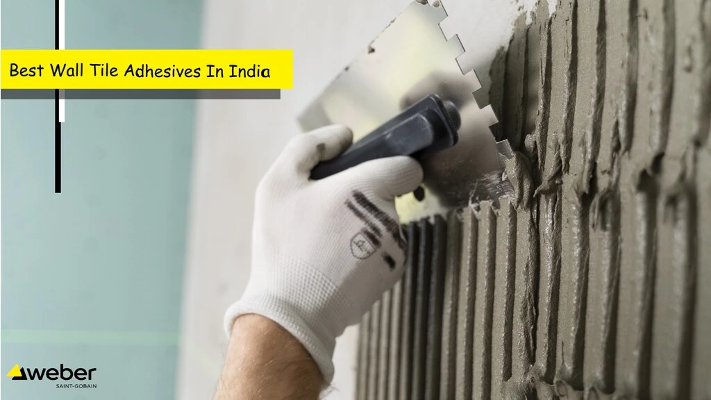Best Wall Tile Adhesives In India - Man Applying Tile Adhesive On Wall